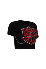 Right side view of black cropped t-shirt with silver chain trim and bold red graphic design.