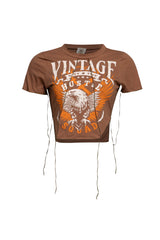 Front view of Vintage Hustle Lace-Up Tee in brown with eagle graphic and "Hustle Squad" text.