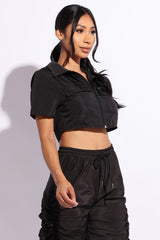 Zipper front short sleeve top with pockets