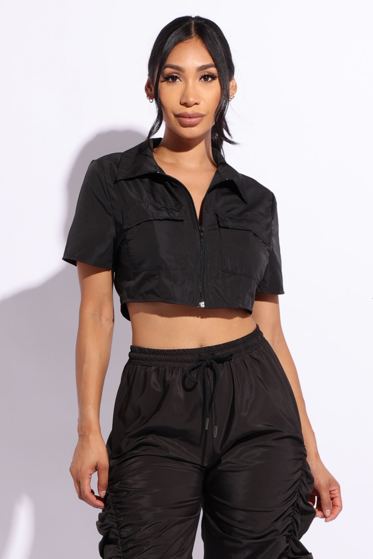 Zipper front short sleeve top with pockets