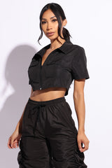 Zipper front short sleeve top with pockets