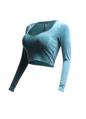 Left side view of teal vintage wash long sleeve crop top highlighting the fitted silhouette.