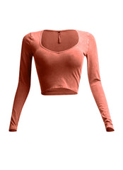 Front view of rust vintage wash long sleeve crop top with V-neckline.