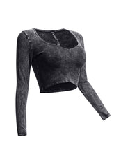 Right side view of black vintage wash crop top with form-fitting long sleeves.