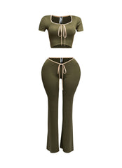 Front view of olive two-piece set with nude trim, featuring a scoop-neck crop top and high-waisted flared pants.