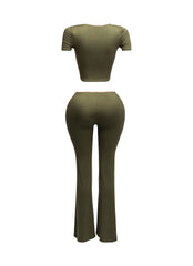 Back view of olive two-piece set with nude trim, showing a flattering fit with curve-hugging pants and cropped top.