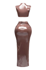 Back view of metallic maxi skirt set, showcasing sleek, form-fitting silhouette