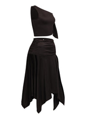 Edgy and flattering off-shoulder asymmetrical top paired with a draped high-slit skirt for ultimate glam vibes.