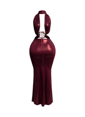 Back view of burgundy backless halter maxi dress with snake-trim detailing and tie closure.