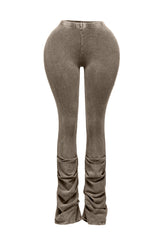 ront view of brown ruched flare leggings with high-waist fit and unique washed effect.